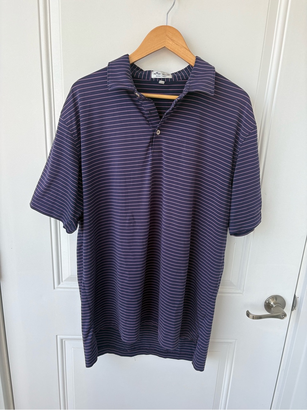 Peter Millar Golf Polo
Missing button, but very easy to reattach